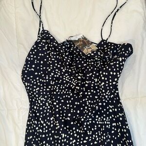 No rest for Bridget - polka dot silk dress. Back slightly cutout.
